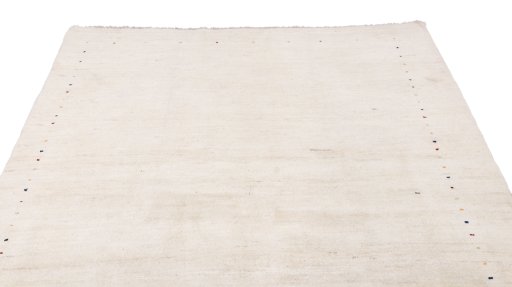 Surface texture of 1980s Lori rug with natural Wool and intricate pattern
