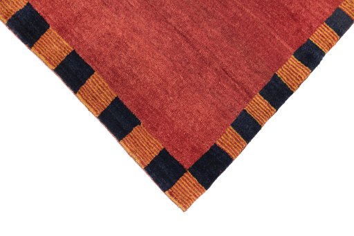 Backside of handmade New Lori rug showing knot structure and weave density