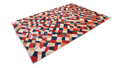 Corner detail of 1980s Lori rug showing border pattern and Wool pile