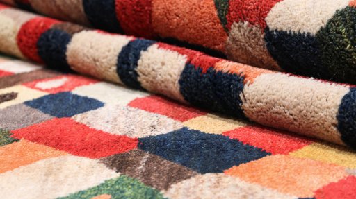 Close-up detail of 1980s Lori rug from Iran / Persia showing Wool weave