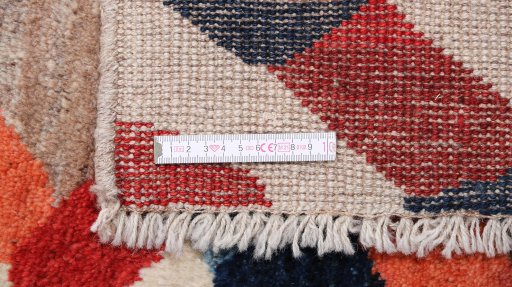 Full view of 1980s Lori rug from Iran / Persia, 221 × 180 cm in Multi Color tones