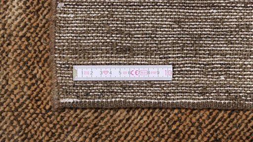 Corner detail of 1980s Lori rug showing border pattern and Wool pile