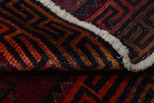Corner detail of 2000s Lori rug showing border pattern and Wool pile
