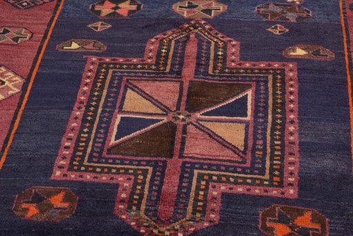 Backside of handmade 2000s Lori rug showing knot structure and weave density