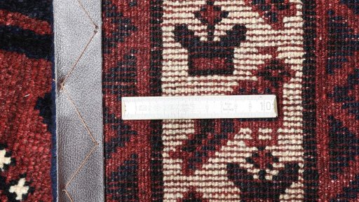 Corner detail of 2000s Lori rug showing border pattern and Wool pile
