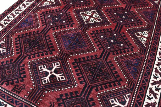 Backside of handmade 2000s Lori rug showing knot structure and weave density