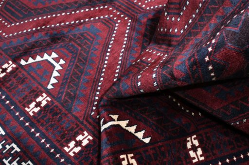 Corner detail of 2000s Lori rug showing border pattern and Wool pile