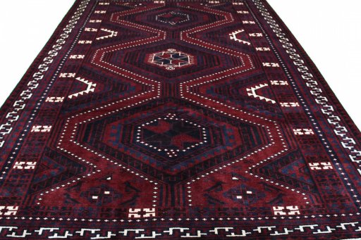 Surface texture of 2000s Lori rug with natural Wool and intricate pattern