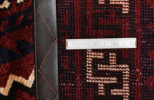 Corner detail of 2000s Lori rug showing border pattern and Wool pile