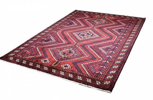Backside of handmade 2000s Lori rug showing knot structure and weave density