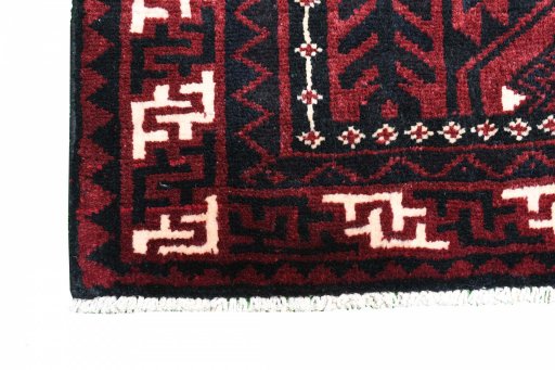Backside of handmade 2000s Lori rug showing knot structure and weave density