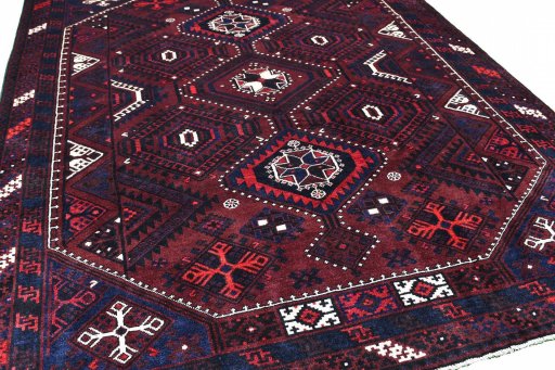 Surface texture of 2000s Lori rug with natural Wool and intricate pattern