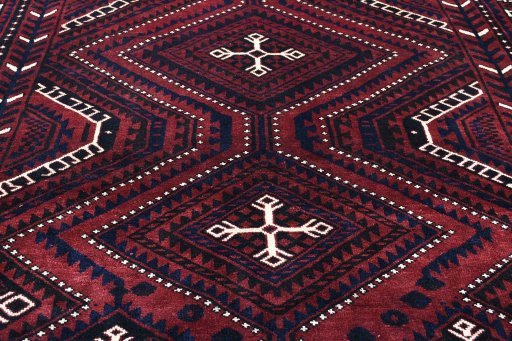 Surface texture of 2000s Lori rug with natural Wool and intricate pattern