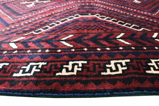 Backside of handmade 2000s Lori rug showing knot structure and weave density