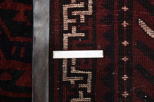 Full view of 2000s Lori rug from Iran / Persia, 297 × 210 cm in Red tones