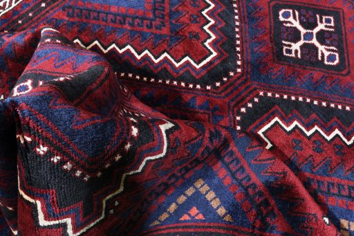 Corner detail of 2000s Lori rug showing border pattern and Wool pile