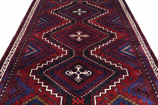 Surface texture of 2000s Lori rug with natural Wool and intricate pattern