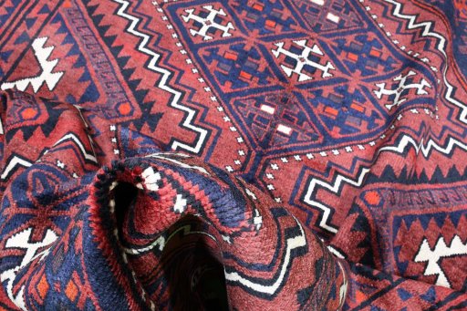 Corner detail of 2000s Lori rug showing border pattern and Wool pile
