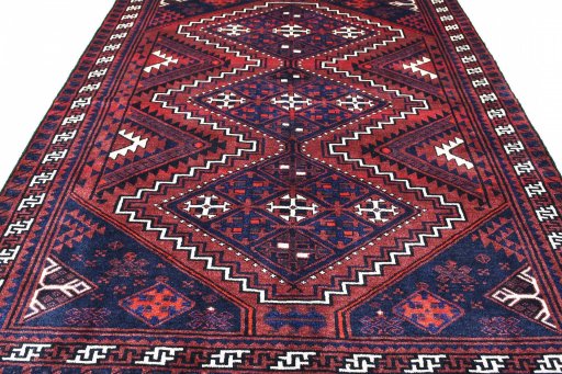 Backside of handmade 2000s Lori rug showing knot structure and weave density