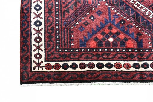 Corner detail of 2000s Lori rug showing border pattern and Wool pile