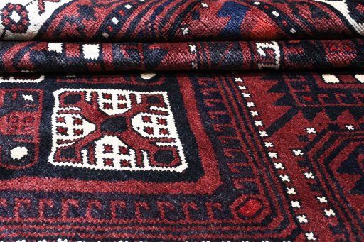 Surface texture of 2000s Lori rug with natural Wool and intricate pattern