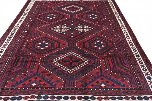 Surface texture of 2000s Lori rug with natural Wool and intricate pattern