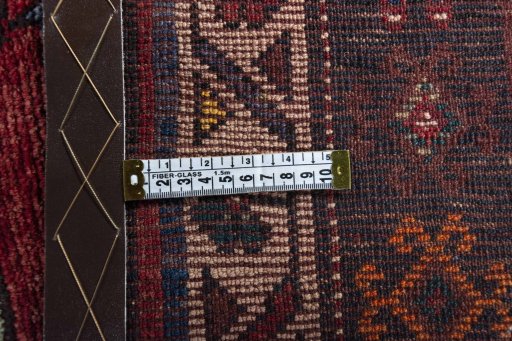 Corner detail of 2000s Lori rug showing border pattern and Wool pile