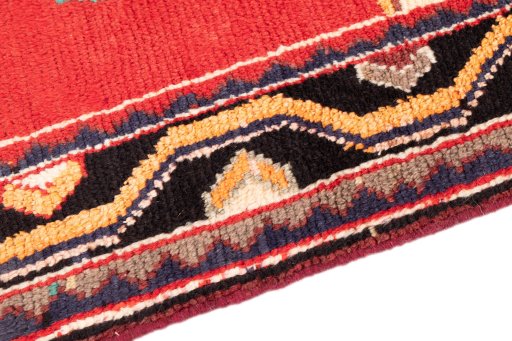 Backside of handmade 1996s Lori rug showing knot structure and weave density