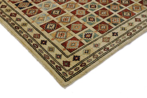 Backside of handmade New Lori rug showing knot structure and weave density