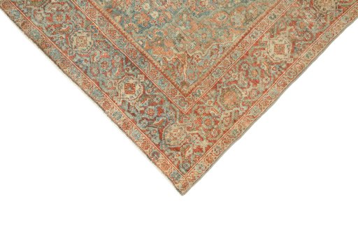 Backside of handmade 1920s Mahal rug showing knot structure and weave density