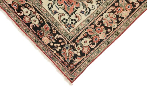 Backside of handmade 1920s Mahal rug showing knot structure and weave density