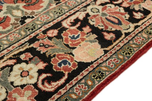 Close-up detail of 1920s Mahal rug from Iran / Persia showing Wool weave