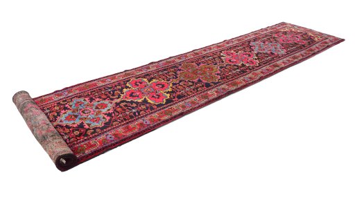 Close-up detail of 1920s Malayer rug from Iran / Persia showing Wool weave