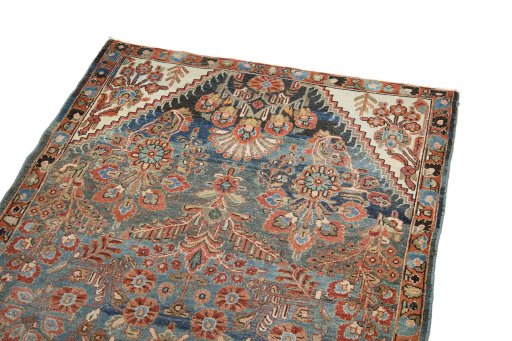 Surface texture of 1920s Malayer rug with natural Wool and intricate pattern