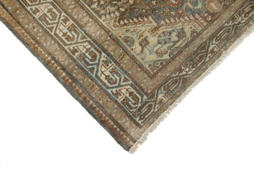 Backside of handmade 1920s Malayer rug showing knot structure and weave density