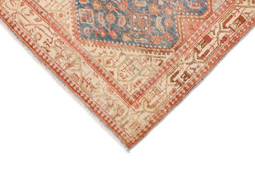 Backside of handmade 1920s Malayer rug showing knot structure and weave density