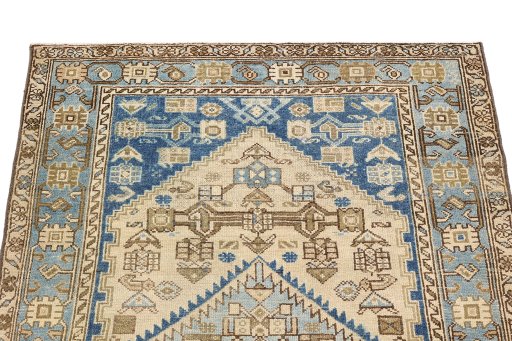 Surface texture of 1920s Malayer rug with natural Wool and intricate pattern