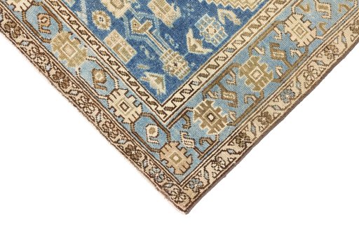 Backside of handmade 1920s Malayer rug showing knot structure and weave density