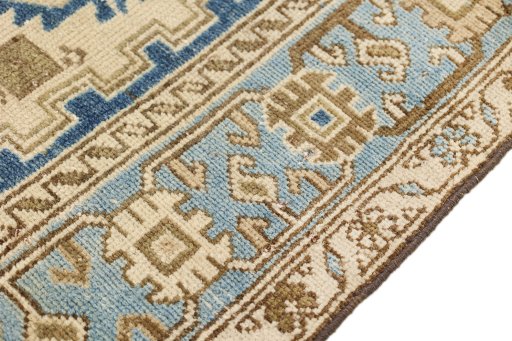 Close-up detail of 1920s Malayer rug from Iran / Persia showing Wool weave