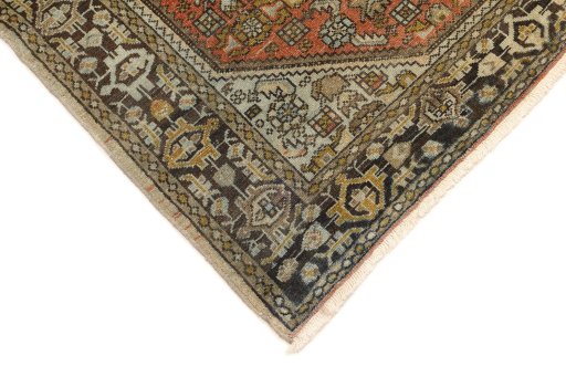 Backside of handmade 1920s Malayer rug showing knot structure and weave density