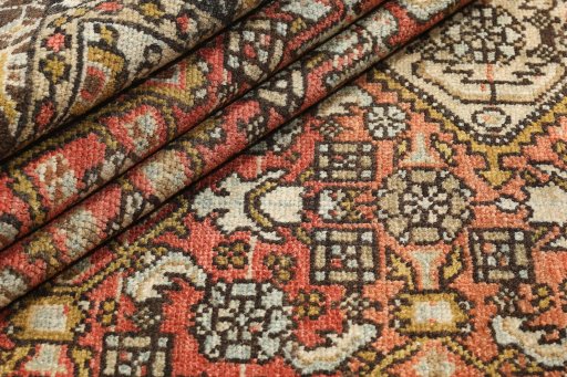 Close-up detail of 1920s Malayer rug from Iran / Persia showing Wool weave