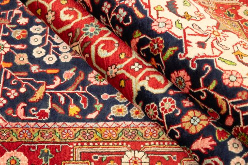 Corner detail of 1950s Malayer rug showing border pattern and Wool pile