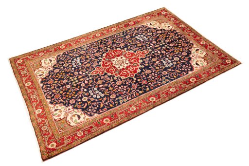 Corner detail of 1950s Malayer rug showing border pattern and Wool pile