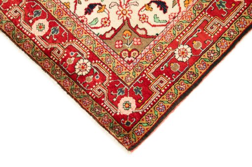 Backside of handmade 1950s Malayer rug showing knot structure and weave density