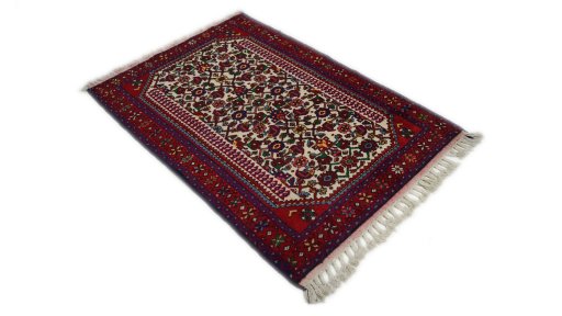 Close-up detail of 1970s Malayer rug from Iran / Persia showing Wool weave