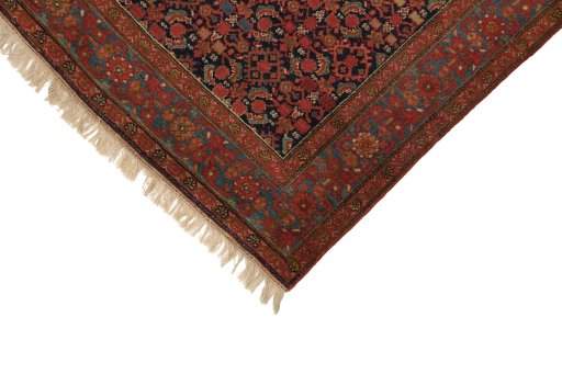 Backside of handmade 1900s Malayer rug showing knot structure and weave density