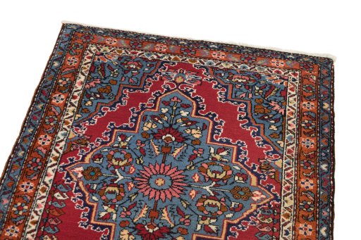 Surface texture of 1980s Malayer rug with natural Wool and intricate pattern