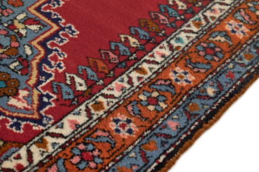 Central medallion detail of 1980s Malayer rug from Iran / Persia
