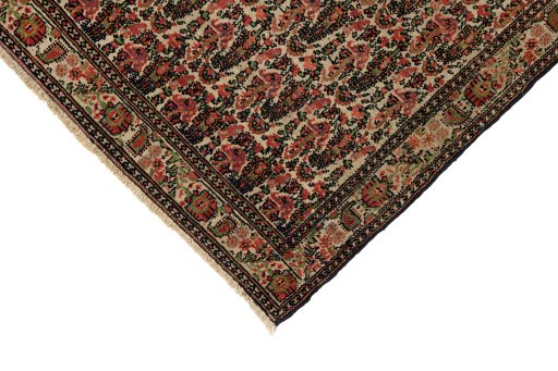 Backside of handmade 1900s Malayer rug showing knot structure and weave density