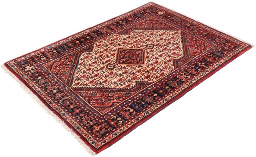 Corner detail of 1940s Malayer rug showing border pattern and Wool pile